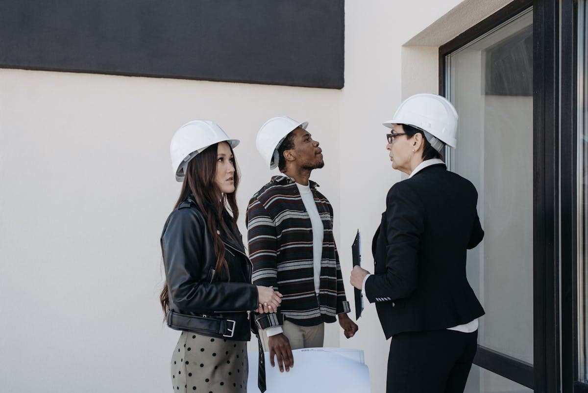 Real estate investment professionals inspecting a property